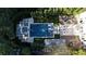 An aerial view of an outdoor living area with pool and spa at 115 17Th Ne St, Atlanta, GA 30309