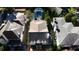 Overhead view of a home nestled between trees in a residential neighborhood at 115 17Th Ne St, Atlanta, GA 30309