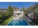 An open backyard featuring a pool and outdoor living area at 115 17Th Ne St, Atlanta, GA 30309