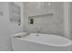 Close up of bright bathroom featuring a modern soaking tub at 115 17Th Ne St, Atlanta, GA 30309