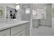 Bright bathroom featuring custom vanity cabinets and a glass shower at 115 17Th Ne St, Atlanta, GA 30309