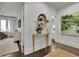 Foyer featuring a console table with floral arrangements at 115 17Th Ne St, Atlanta, GA 30309