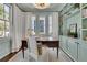 Charming home office with custom built-ins, a large window, and elegant decor at 115 17Th Ne St, Atlanta, GA 30309