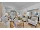 Airy living room featuring hardwood floors, neutral decor and decorative furnishings at 115 17Th Ne St, Atlanta, GA 30309