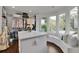 Spacious walk-in closet featuring custom shelving and a window seat at 115 17Th Ne St, Atlanta, GA 30309