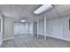 Large basement featuring gray wood floors and white doors at 4253 Smithsonia Dr, Tucker, GA 30084