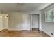 Bedroom featuring natural light, a closet, and hardwood floors, providing a comfortable and bright living space at 4253 Smithsonia Dr, Tucker, GA 30084