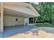 Covered patio with lots of space and views of the backyard at 4253 Smithsonia Dr, Tucker, GA 30084