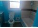 Compact bathroom with a tub/shower combination and modern fixtures at 6258 Mount Zion Blvd, Morrow, GA 30260