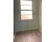 Bedroom featuring modern flooring and natural light from the window at 6258 Mount Zion Blvd, Morrow, GA 30260