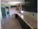 Well-equipped kitchen featuring modern cabinets, granite countertops, and stylish flooring at 6258 Mount Zion Blvd, Morrow, GA 30260
