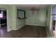 Open living room with bar access to kitchen and natural light at 6258 Mount Zion Blvd, Morrow, GA 30260