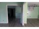 Open-concept living room featuring fresh paint and new flooring at 6258 Mount Zion Blvd, Morrow, GA 30260