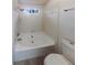 Bright bathroom featuring a large soaking tub with tile surround at 6420 Wedgeview Dr, Tucker, GA 30084