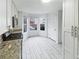 Eat-in kitchen with natural light, modern appliances, and stylish finishes at 6420 Wedgeview Dr, Tucker, GA 30084