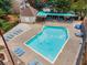 Community pool with lounge chairs and covered seating for residents' enjoyment on a sunny day at 6420 Wedgeview Dr, Tucker, GA 30084