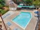 An inviting community pool area features lounge chairs and covered seating for relaxing by the refreshing water at 6420 Wedgeview Dr, Tucker, GA 30084