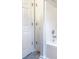 Bright bathroom features tub and shower combination, along with tiled floor at 781 Courthouse Park Dr, Temple, GA 30179