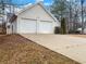 Two car garage with a long drive way and lots of space for parking at 781 Courthouse Park Dr, Temple, GA 30179