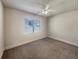 Cozy bedroom with natural light and neutral carpet flooring at 1340 Apple Blossom Dr, Cumming, GA 30041