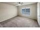 A bright bedroom featuring a ceiling fan and neutral walls to fit any design at 1340 Apple Blossom Dr, Cumming, GA 30041