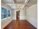 Charming dining room with coffered ceiling, wainscoting, and hardwood floors at 1340 Apple Blossom Dr, Cumming, GA 30041