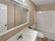 Bathroom featuring a vanity, mirror, and shower-tub combination at 166 Floresta Dr, Mcdonough, GA 30252