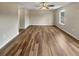 The large living room features hard wood floors at 166 Floresta Dr, Mcdonough, GA 30252