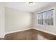 This bedroom has wooden floors and a window for natural light at 3137 Primrose St, Douglasville, GA 30135