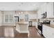 Kitchen area with white cabinets, stainless steel appliances, and granite countertops at 3137 Primrose St, Douglasville, GA 30135