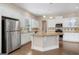 Spacious kitchen featuring a large island, granite countertops, and stainless appliances at 3137 Primrose St, Douglasville, GA 30135