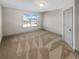 Neutral bedroom with plush carpeting and natural light at 3308 Steeple Chase Sw Way, Conyers, GA 30094