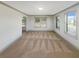 An empty carpeted bedroom featuring natural light from two windows at 3308 Steeple Chase Sw Way, Conyers, GA 30094