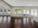 Spacious living room with hardwood floors and lots of natural light at 3308 Steeple Chase Sw Way, Conyers, GA 30094