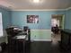 Home office featuring hardwood floors, neutral paint colors, and ample natural light from the window at 3578 Willow Spring Ct, Decatur, GA 30034