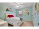 Stylish bedroom featuring a comfortable bed, bright lighting, and a colorful, inviting decor at 4080 Huron Dr, Cumming, GA 30028