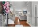 Welcoming foyer with hardwood floors, staircase, and elegant decor leading into the living space at 4080 Huron Dr, Cumming, GA 30028