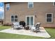 Backyard patio with outdoor furniture, a grill, and a cozy fire pit at 4080 Huron Dr, Cumming, GA 30028