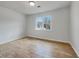 Cozy bedroom featuring new flooring and a view from a double-hung window at 51 Lost Meadows Dr, Dallas, GA 30157