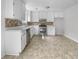 Bright kitchen featuring white cabinets, stainless steel appliances, and a tile backsplash at 51 Lost Meadows Dr, Dallas, GA 30157