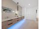 Bright bathroom with long countertops, dual sinks, modern lighting, and lots of storage at 2940 Old Peachtree Rd, Dacula, GA 30019