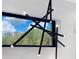 Modern chandelier with an artistic design, adding a focal point to the space and complementing the window view at 2940 Old Peachtree Rd, Dacula, GA 30019