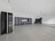 Spacious garage with epoxy flooring, organized storage systems, and ample room for vehicles and projects at 2940 Old Peachtree Rd, Dacula, GA 30019