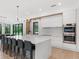 Spacious kitchen with a large island, modern appliances, and sleek cabinetry at 2940 Old Peachtree Rd, Dacula, GA 30019