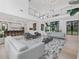 Open-concept living room with staircase and high ceilings at 2940 Old Peachtree Rd, Dacula, GA 30019