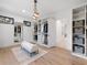 Large walk-in closet with custom shelving, seating, generous storage and access to other rooms at 2940 Old Peachtree Rd, Dacula, GA 30019