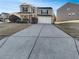 Charming two-story home featuring a two-car garage and well-maintained landscaping at 2985 Whittier Way, Cumming, GA 30040