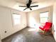 Cozy bedroom with natural light, ceiling fan, and neutral paint offers a versatile space for rest and personalization at 3155 Oakcliff Nw Rd, Atlanta, GA 30311