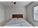 Bedroom with neutral walls, carpet, and window for plenty of natural light at 4825 Odum View Ln, Cumming, GA 30040