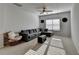 Bright and airy bonus room featuring a comfortable sofa, chair and ample space for relaxation and entertainment at 4825 Odum View Ln, Cumming, GA 30040
